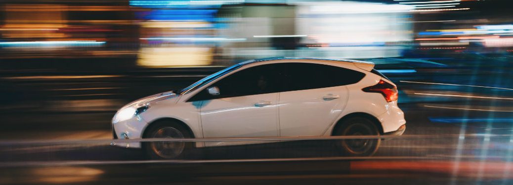car driving fast on a road