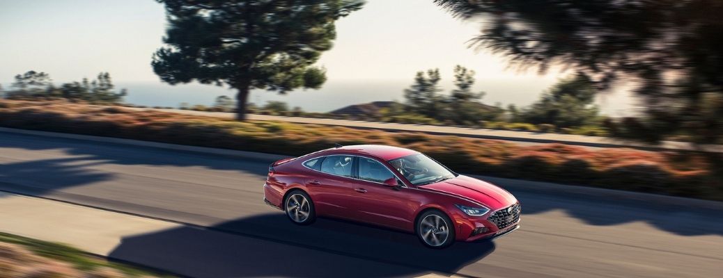 A red 2022 Hyundai Sonata on the road