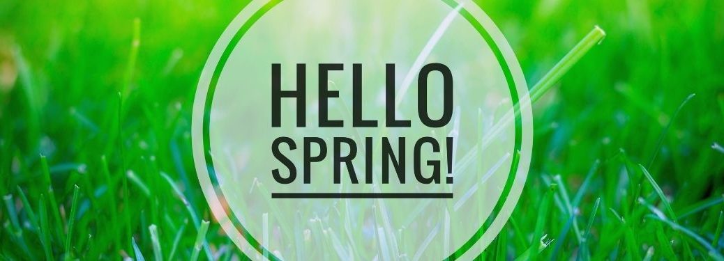 Hello Spring banner with grass in the background