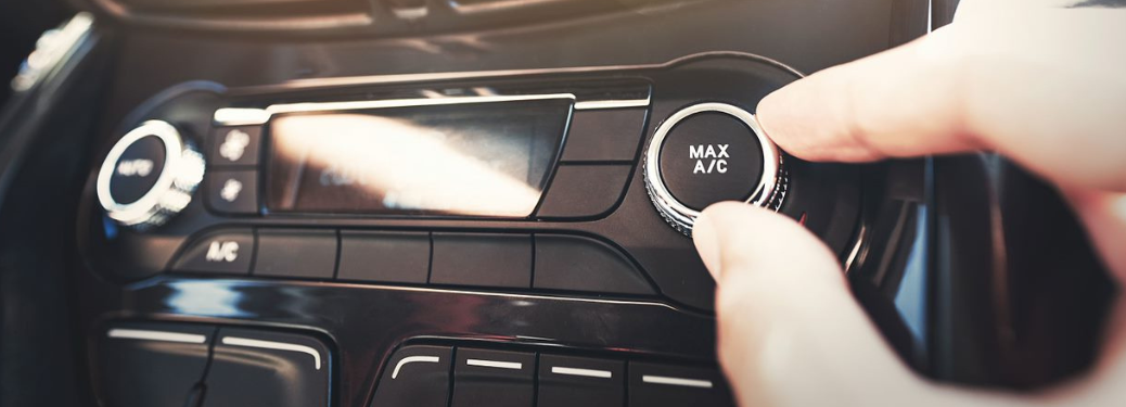 A person operating the air conditioner