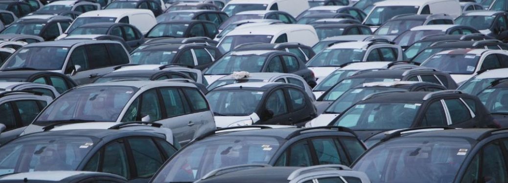 Top view of used cars for sale at a dealership