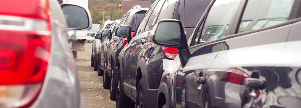 Used cars on display at a dealership