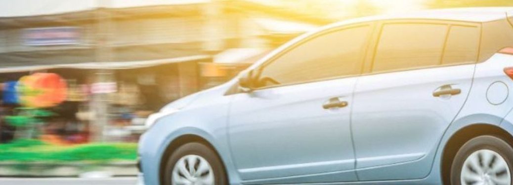 Side view of a used car on the road