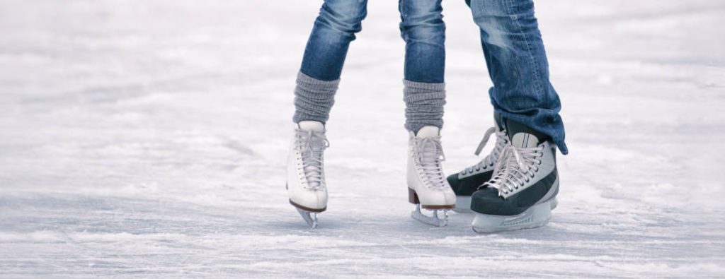 Two people at one of the best places for ice skating in Austin