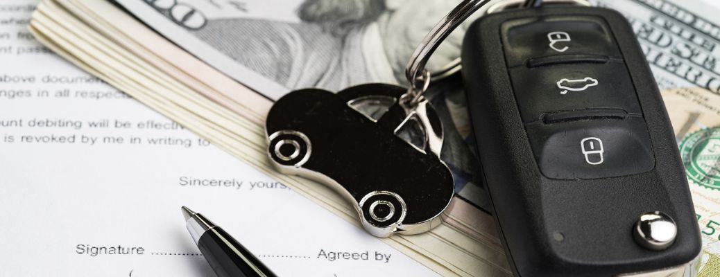 Car key kept on top of cash