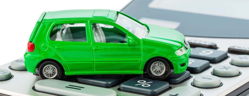 Toy car on top of a calculator
