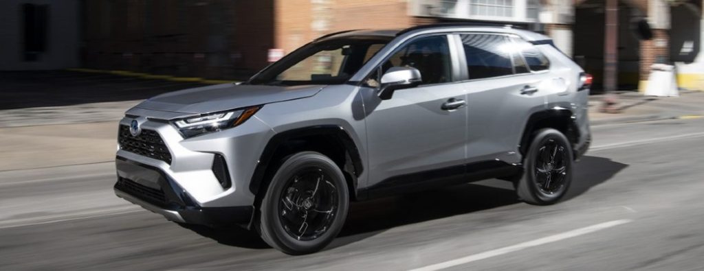 used Toyota RAV4 SUV on a city street