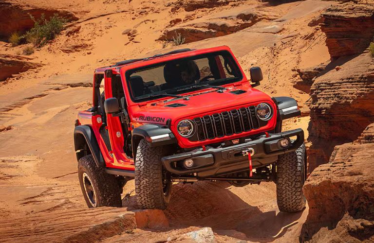 a used red Jeep vehicle