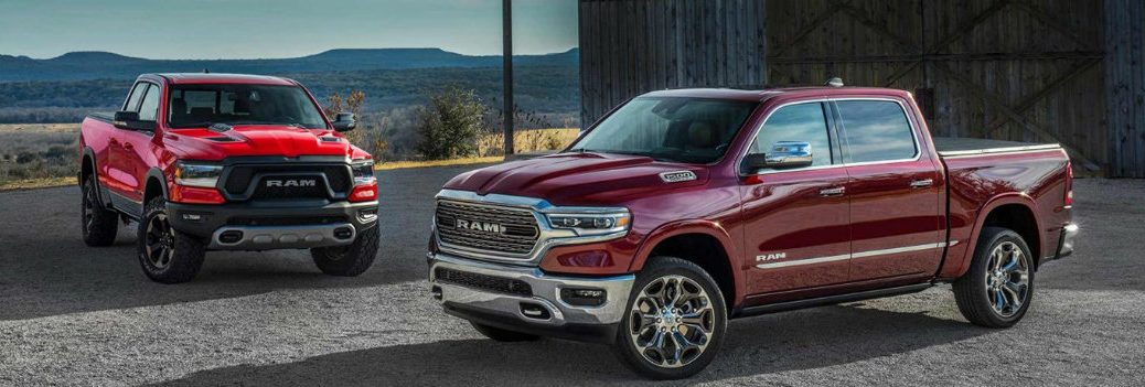 2019 Ram 1500 models exterior shot parked outside barn in the country with standard and limited trim levels