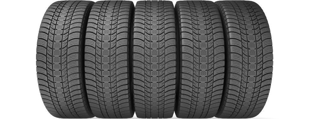 A lineup of tires that are ready to go on a vehicle.