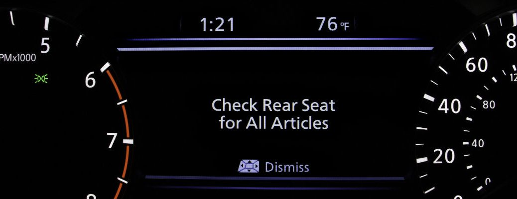 A photo of the Rear Door Alert notification that will be shown in properly-equipped Nissan vehicle.