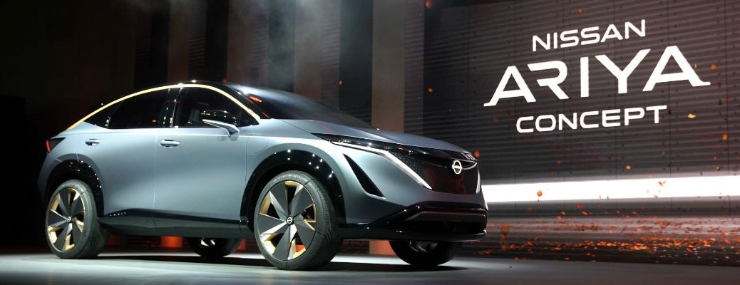 A photo of the Nissan Aryia Concept on stage at the Toyota Motor Show.