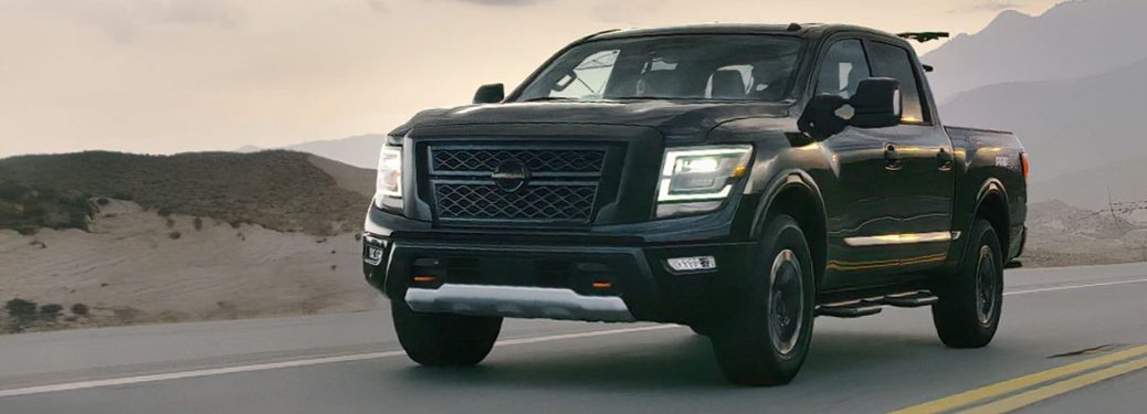 2020 Nissan TITAN cruising down the road
