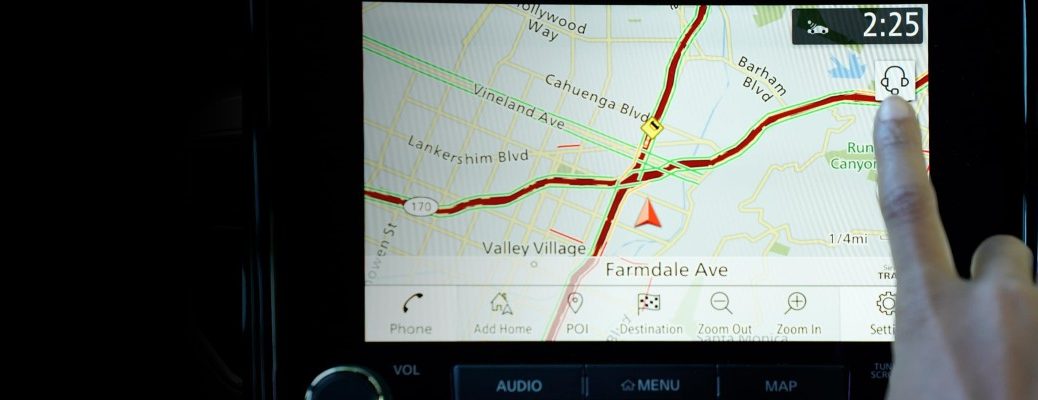 A photo of a person activating the Nissan Concierge system.