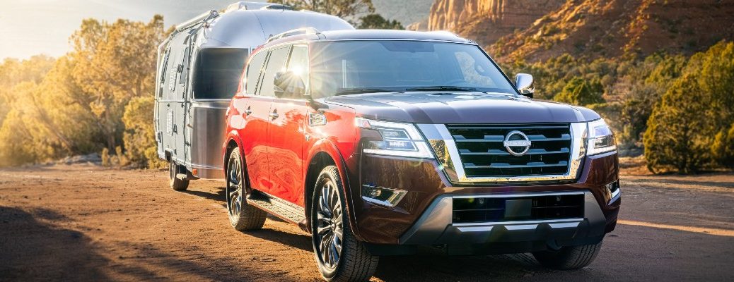 A 2021 Nissan Armada pulling an Airstream mobile home.