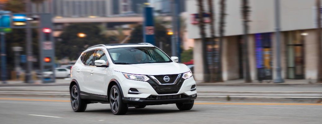 The 2021 Nissan Rogue Sport on a city street.
