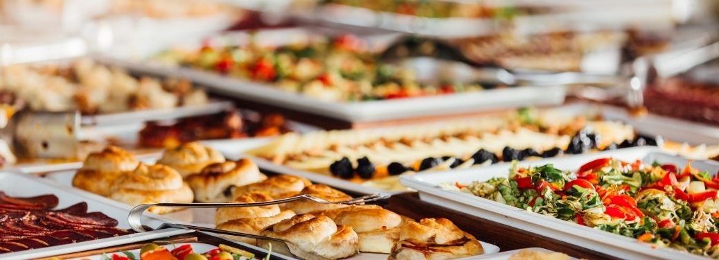 Several dishes served on a restaurant table