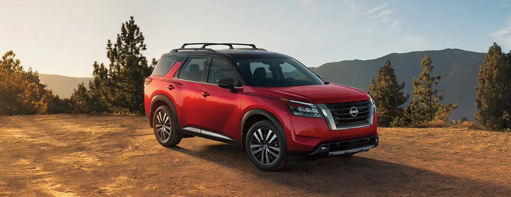 A 2024 Nissan Pathfinder on a muddy terrain
