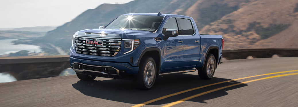 Side view of the 2025 GMC Sierra 1500 on road
