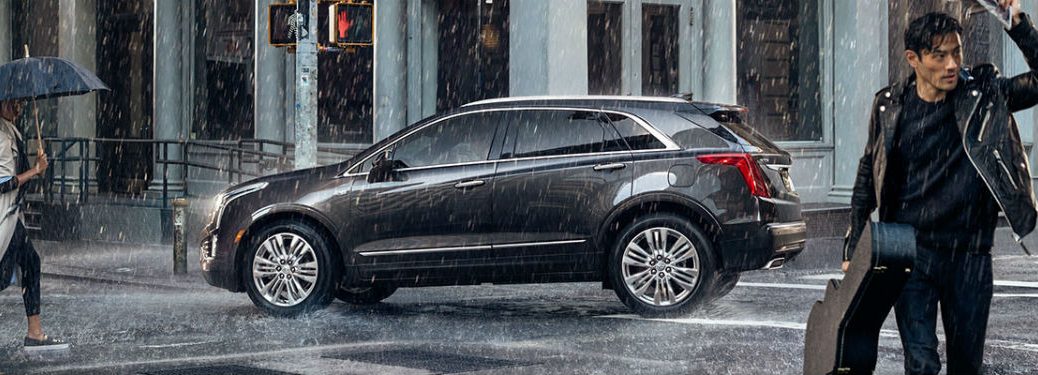Driver's side exterior view of a gray 2018 Cadillac XT5