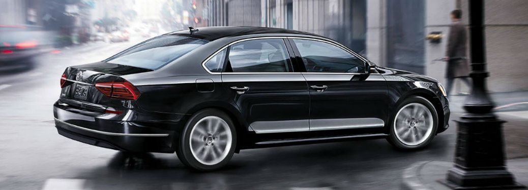 Passenger side exterior view of a black 2018 VW Passat