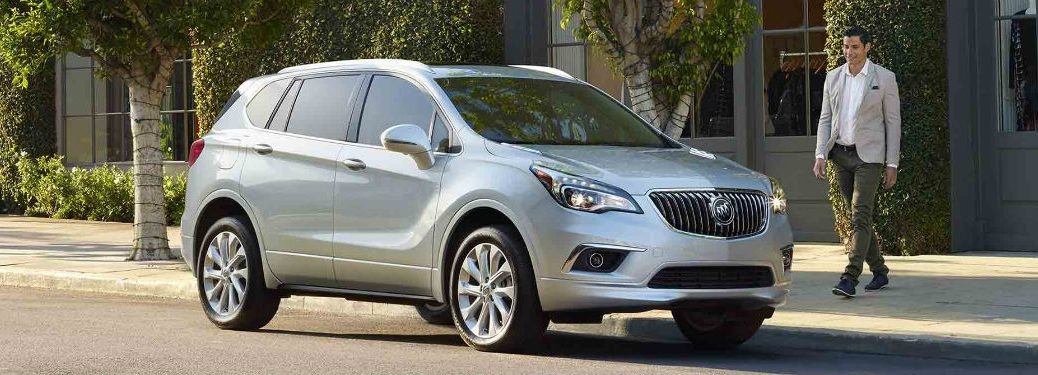 Passenger side exterior view of a gray 2018 Buick Envision