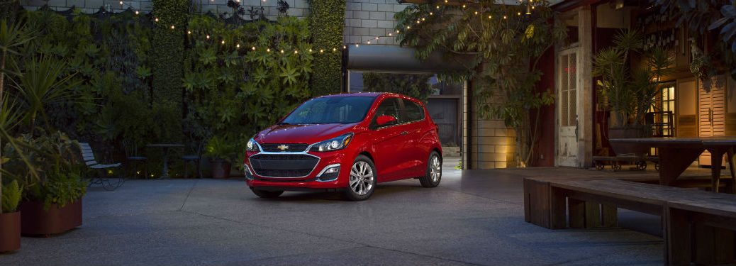 Driver side exterior view of a red 2019 Chevrolet Spark