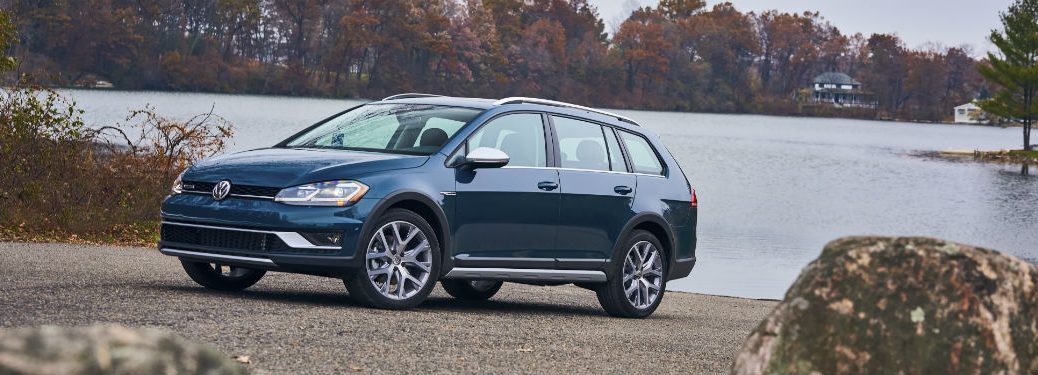 Driver side exterior view of a blue 2018 VW Golf Alltrack