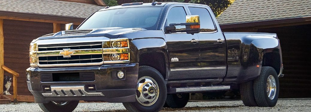 Driver side exterior view of a black 2019 Chevy Silverado 3500