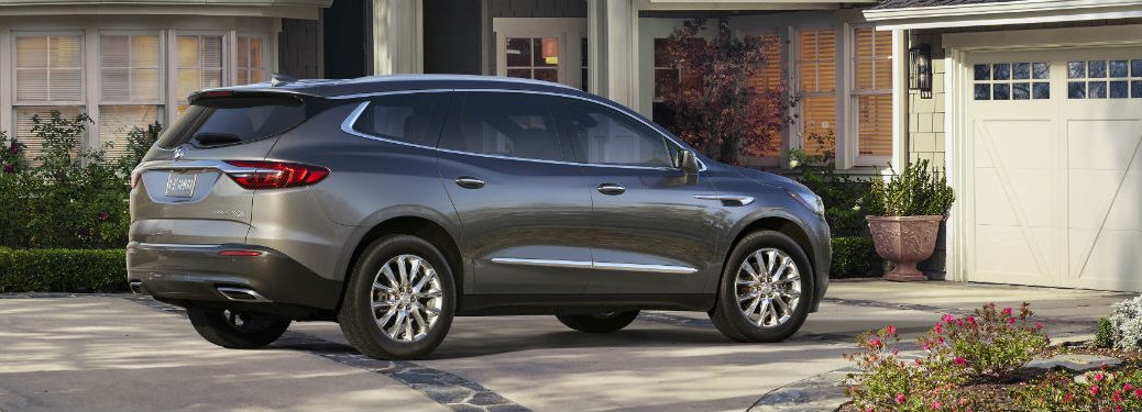Passenger side exterior view of a gray 2019 Buick Enclave