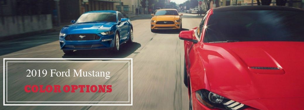 2019 Ford Mustang Color Options, text on an image of the front exterior of a blue, orange, and red 2019 Ford Mustang