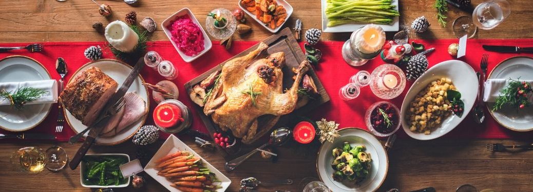 Food at Christmas dinner table from above
