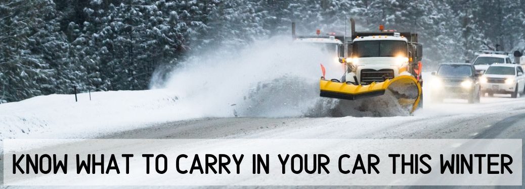 Snow plow on snowy road with car behind it and text below saying Know What To Carry in Your Car This Winter