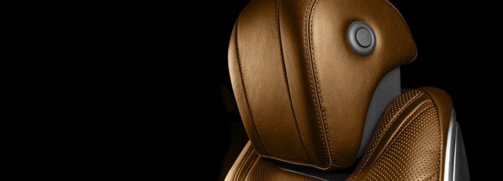 Brown leather headrest on a vehicular seat