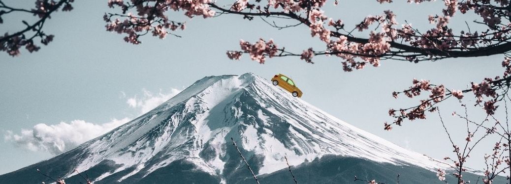 Automobile ambles down Mt. Fuji