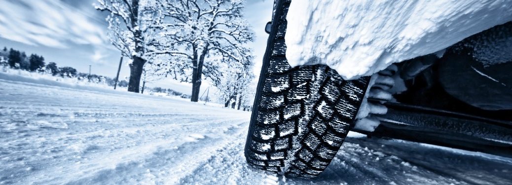 Car tire on a winter road