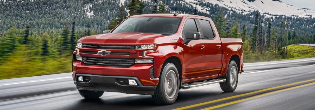 Red 2021 Chevy Silverado on highway