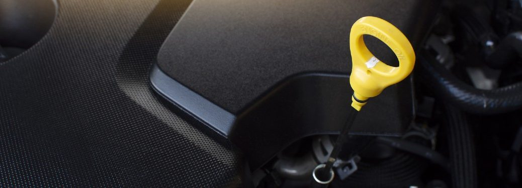 Close up of the dipstick in a car engine