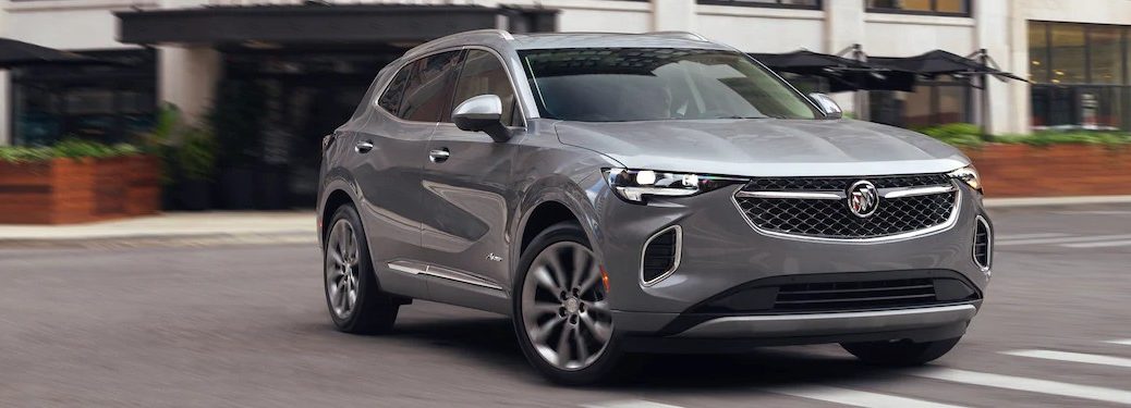 Front passenger angle of a grey 2021 Buick Envision