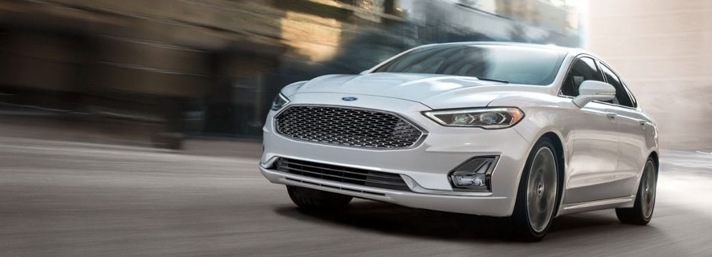White 2020 Ford Fusion cruising on the road