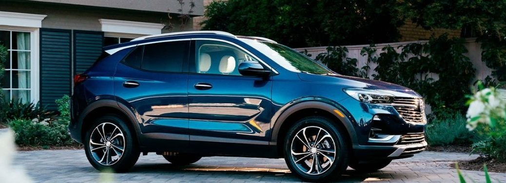 The 2021 Buick Encore GX parked in front of a house.