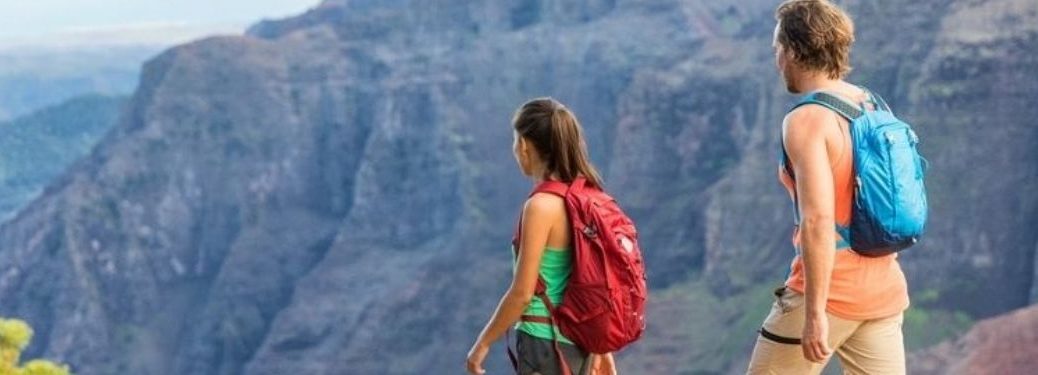 Couple hiking with backpacks