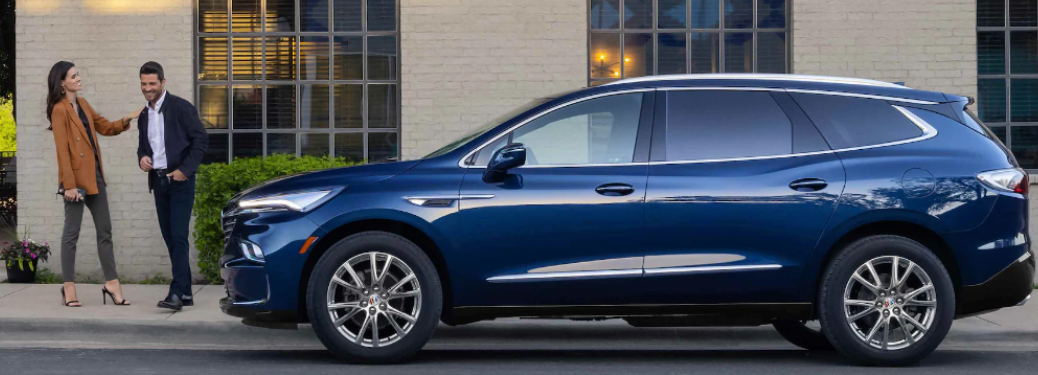 2023 Buick Enclave parked in front of a building