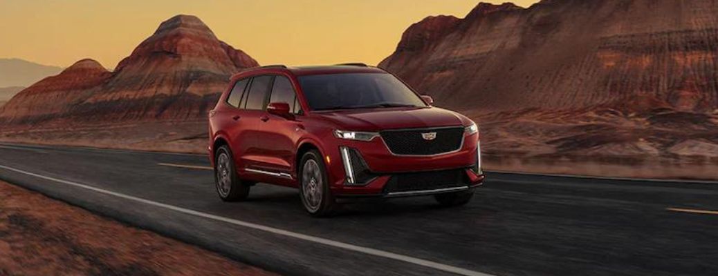 Front view of the 2023 Cadillac XT6 driving on highway