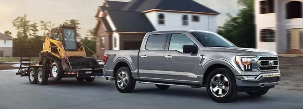 2022FordF-150 pulling a tractor