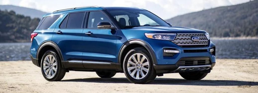 A side view of a red 2023 Ford Explorer.