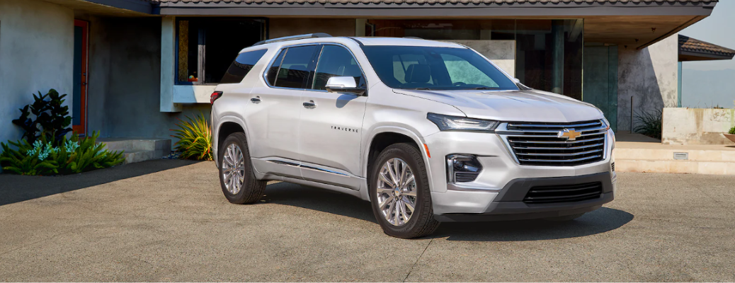 2023 Chevrolet Traverse parked in front of a building