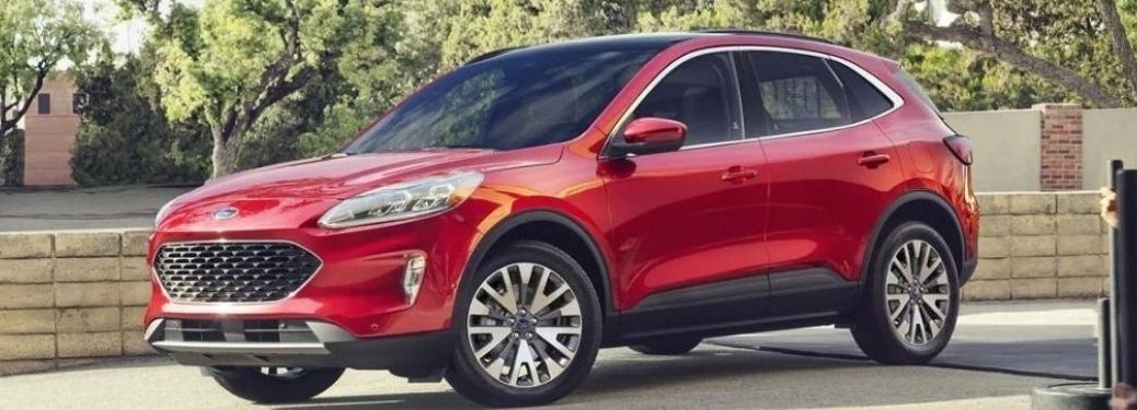 2022 Ford Escape Red parked outside a house