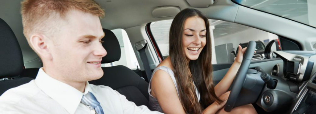 Customer and a salesperson in a car