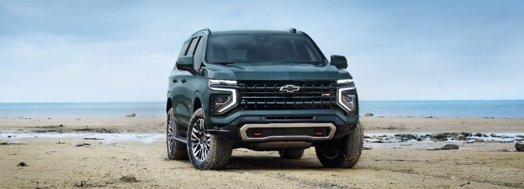 2025 Chevrolet Tahoe parked on a beach